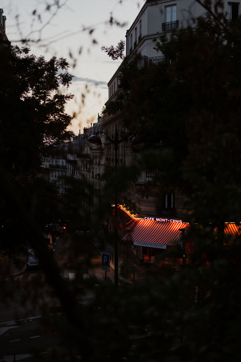 Montmartre just before sunrise - The neon sign of a typical parisian café